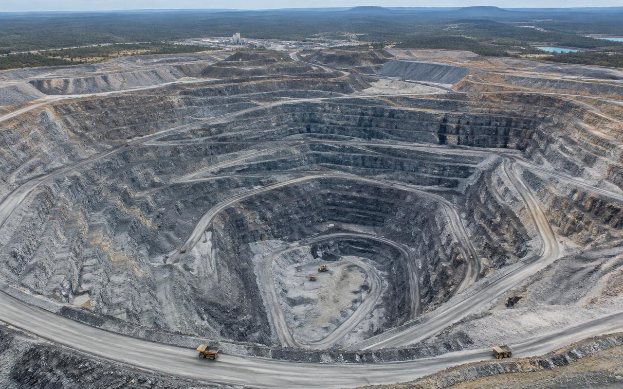 Aerial view of terraced mining infrastructure
